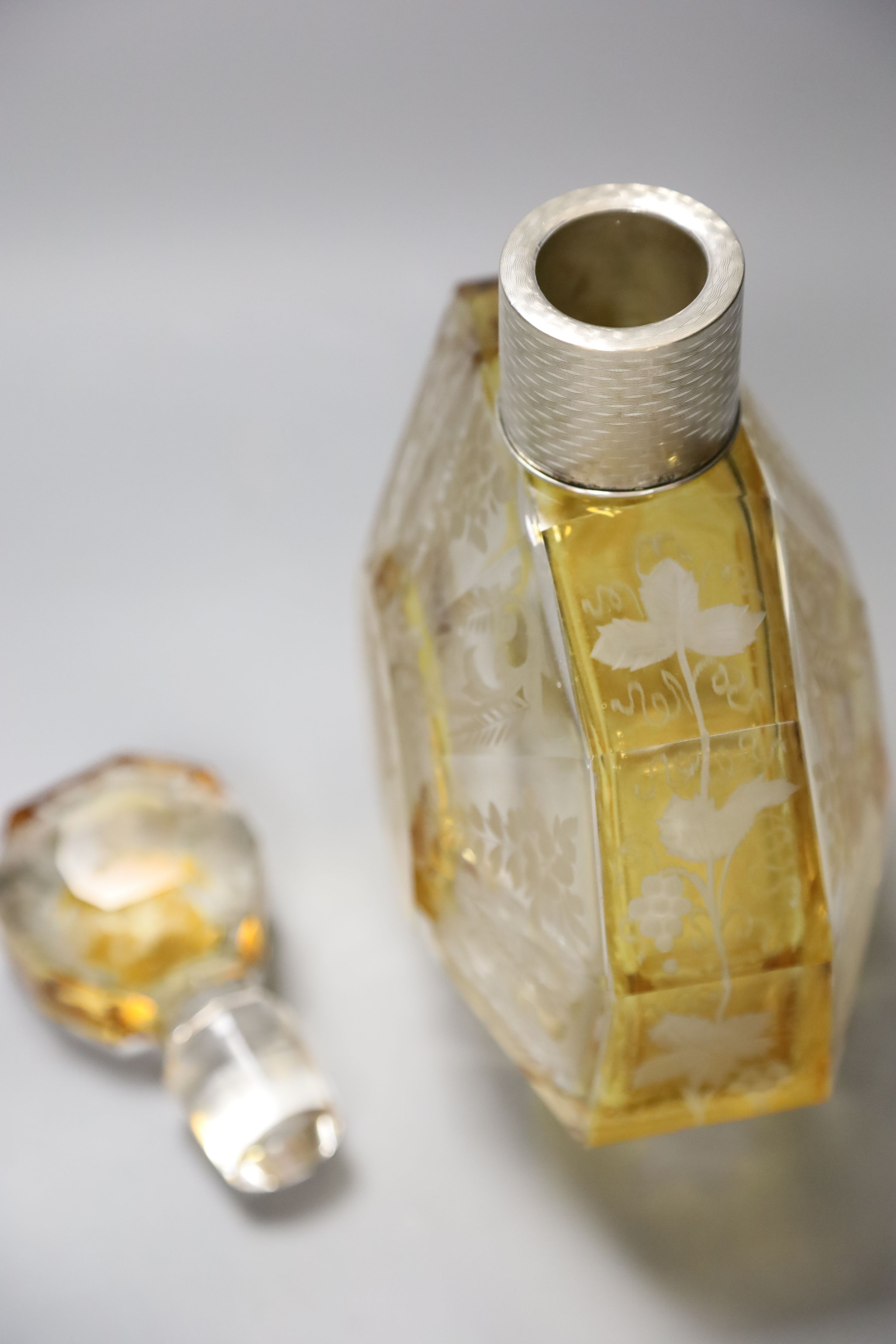 A Bohemian cut glass scent bottle with German 800 standard silver collar, height 25cm